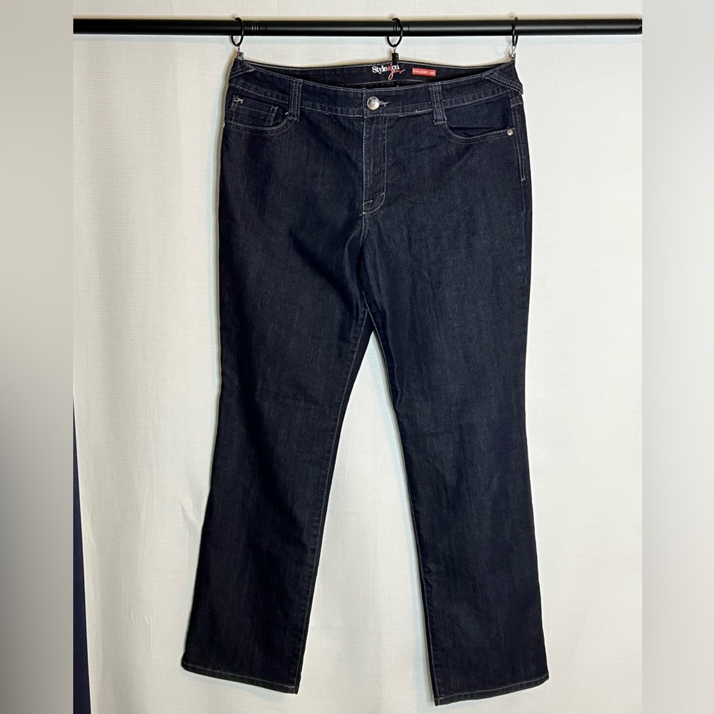 Style and company size 16 jeans with rhinestone accents on back pockets